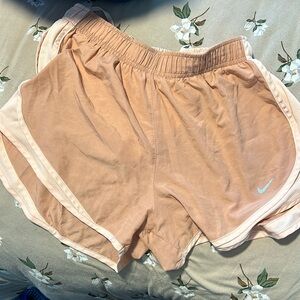 Peach Nike shorts